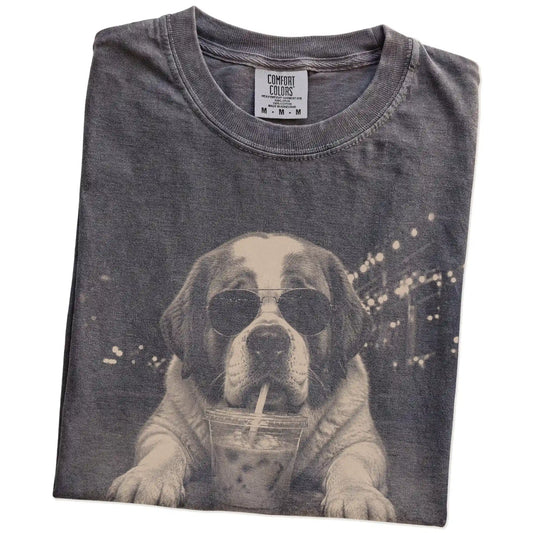 Folded Pepper Comfort Colors® T-shirt showing Saint Bernard with iced coffee in a retro grunge design