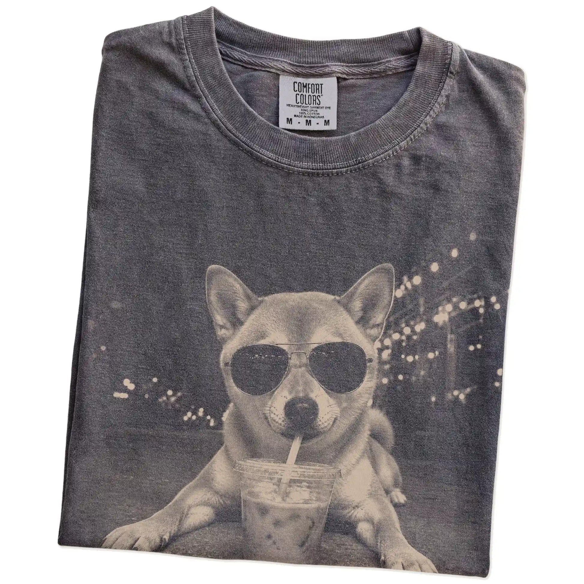 Folded Pepper Comfort Colors® T-shirt showing Shiba Inu with iced coffee in a retro grunge design