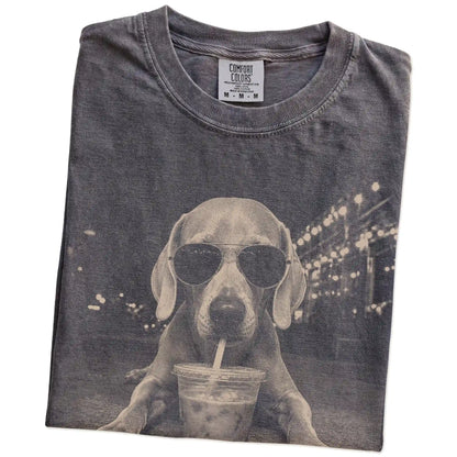 Folded Pepper Comfort Colors® T-shirt showing Weimaraner with iced coffee in a retro grunge design