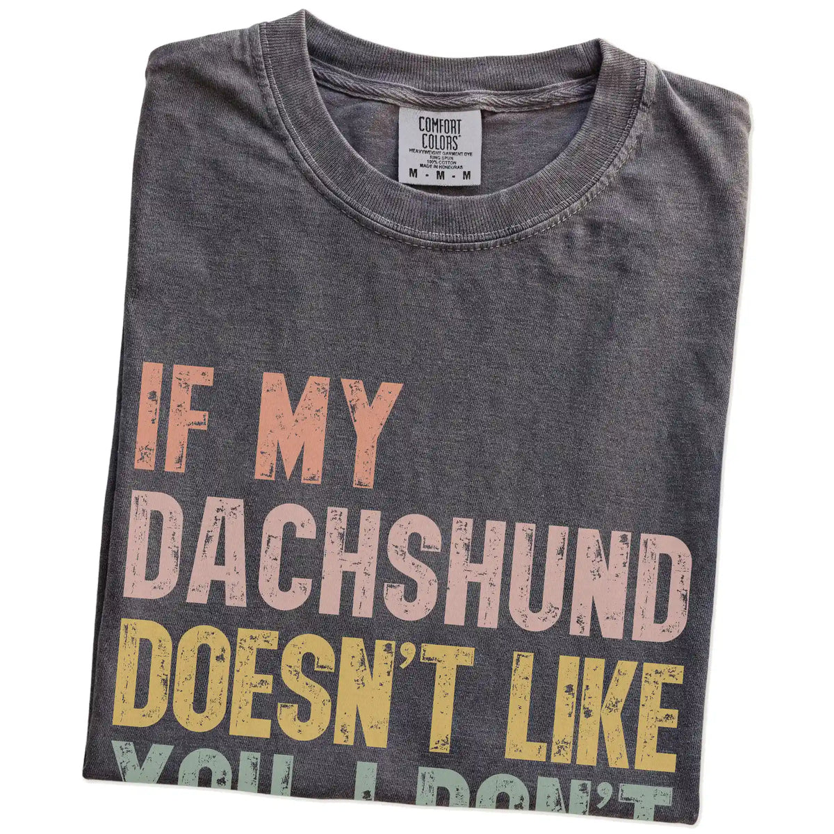 Folded Pepper Comfort Colors® T-shirt showing Dachshund with “If My Dog Doesn’t Like You, I Don’t Either” lettering