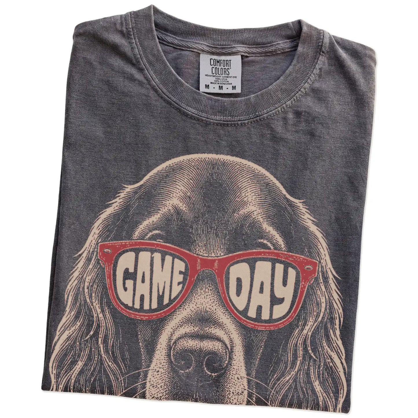 Folded Pepper Comfort Colors® T-shirt showing irish setter wearing red game day sunglasses