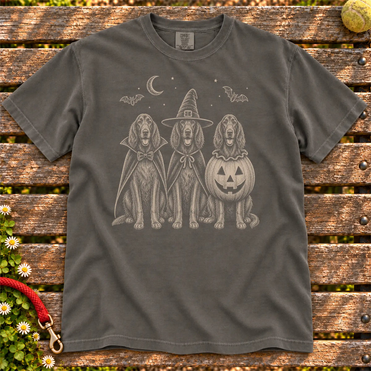Three Irish Setter dogs dressed for Halloween beneath bats and a crescent moon on a Pepper Comfort Colors® T-shirt