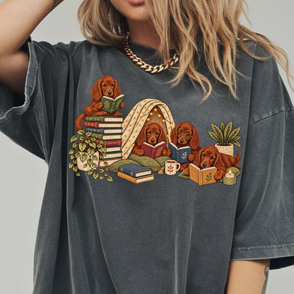 Irish Setter puppies reading books in a cozy blanket fort on a Pepper T-shirt worn by a model