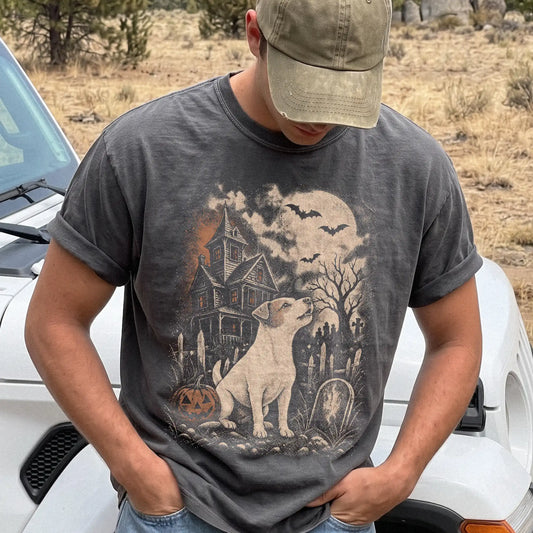 Model wearing a Pepper Comfort Colors® T-shirt showing Jack Russell in a vintage haunted-house scene