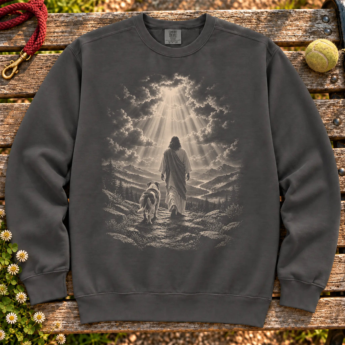 Pepper sweatshirt showing Jesus walking beside a American Bulldog beneath rays of light