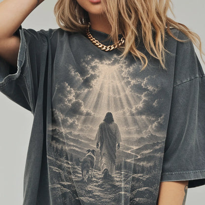 Person wearing a Pepper T-shirt with Jesus walking beside a Boxer beneath rays of light