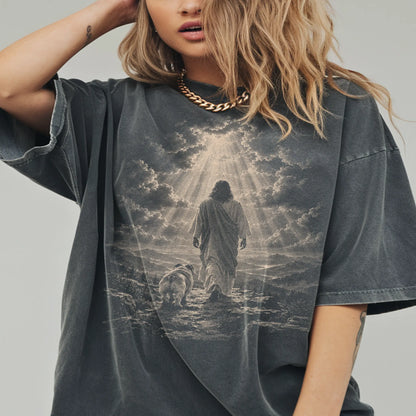 Person wearing a Pepper T-shirt with Jesus walking beside a Bulldog beneath rays of light