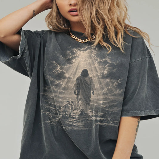 Person wearing a Pepper T-shirt with Jesus walking beside a Bulldog beneath rays of light