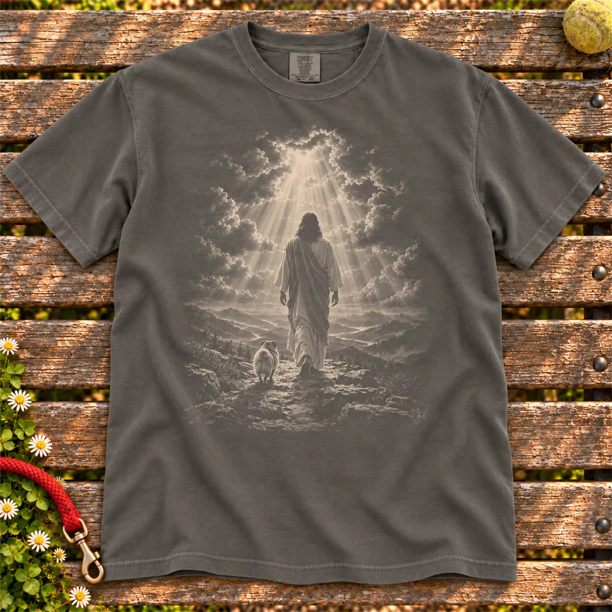 Pepper T-shirt showing Jesus walking beside a Pug beneath rays of light