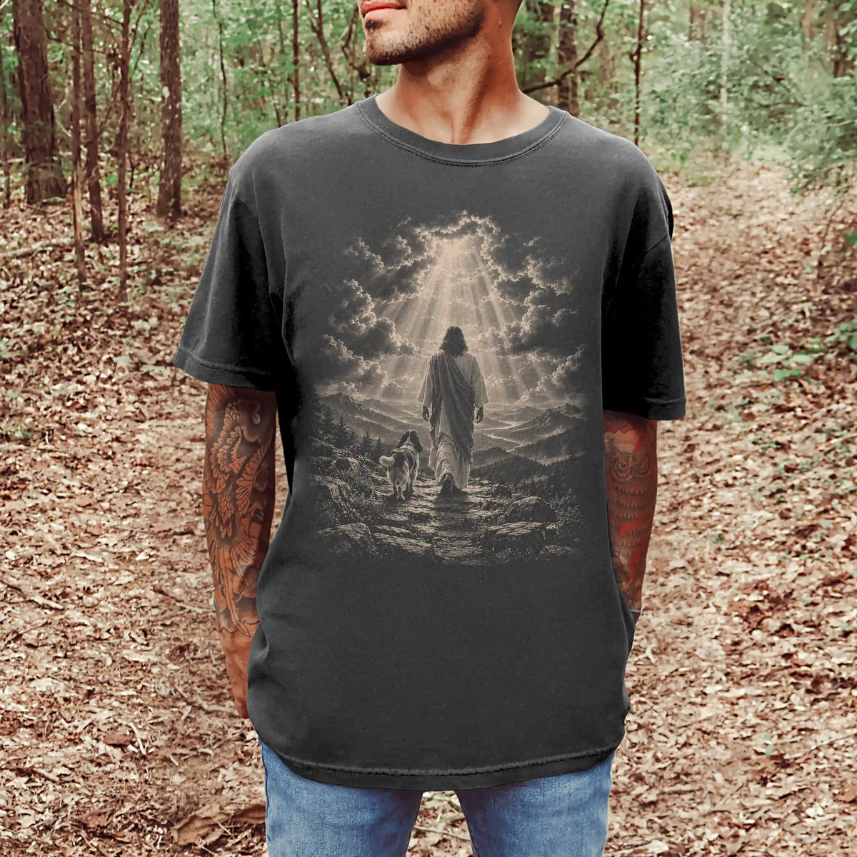 Person wearing a Pepper T-shirt with Jesus walking beside a Springer Spaniel beneath rays of light
