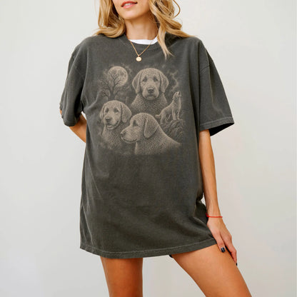 Model wearing a Pepper Comfort Colors® T-shirt with a vintage moon montage featuring Labradoodle