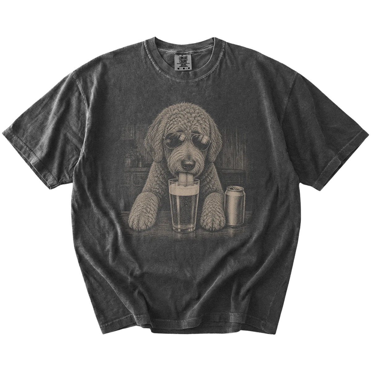 Labradoodle sneaking a drink from a foamy pint at home on a Pepper Comfort Colors® t-shirt