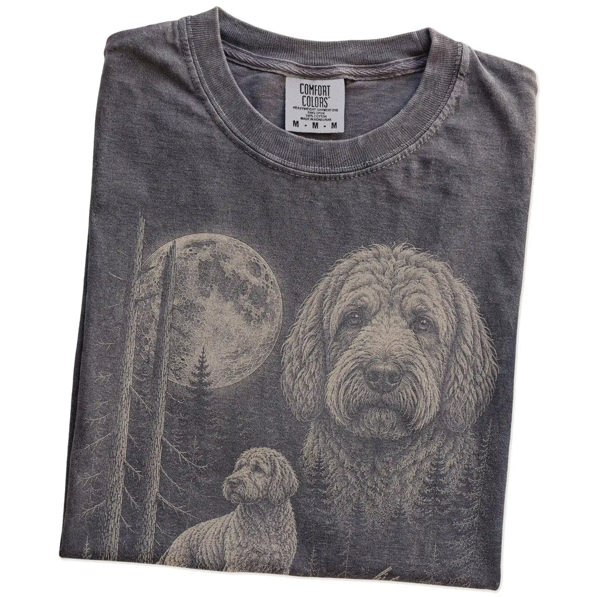 Folded Pepper Labradoodle Moonlit Forest T-Shirt showing the graphic