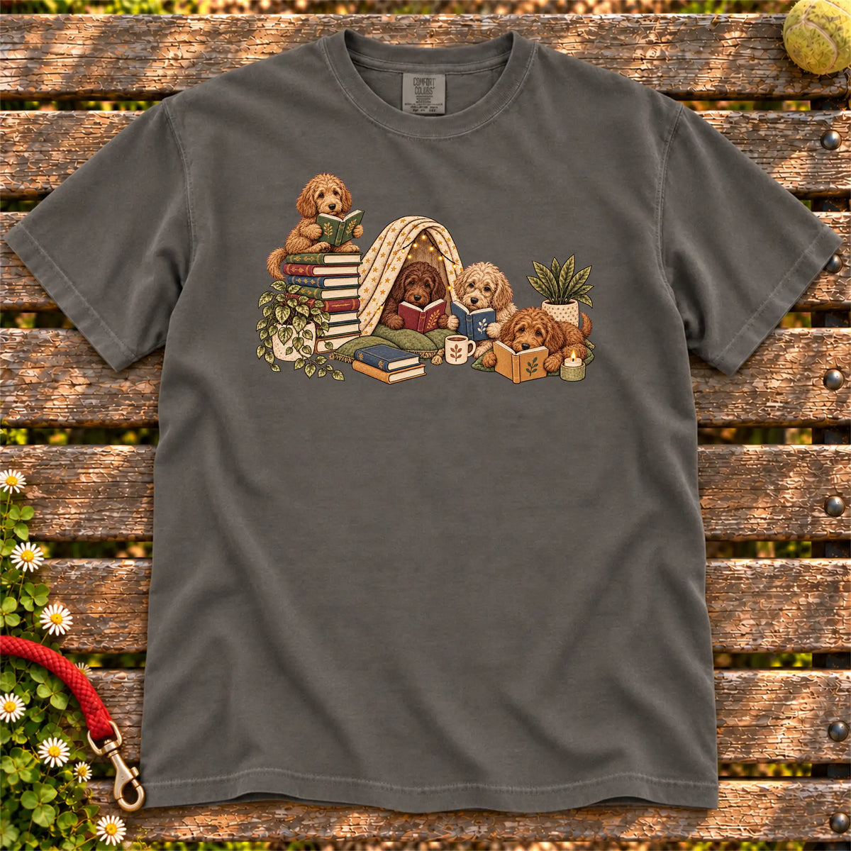 Labradoodle puppies reading books in a cozy blanket fort on a Pepper T-shirt