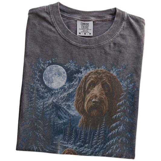 Folded pepper T-shirt with Labradoodle Winter Moon artwork.