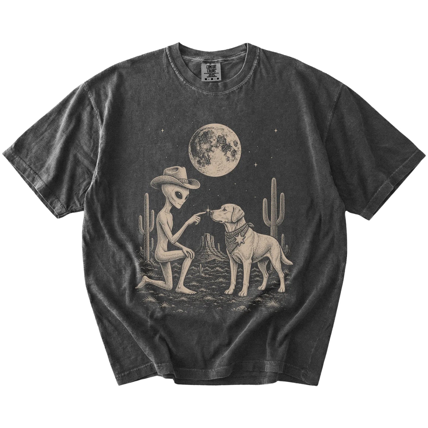 Cowboy alien fist-bumping a Labrador Retriever beneath the moon on a Pepper Comfort Colors® T-shirt
