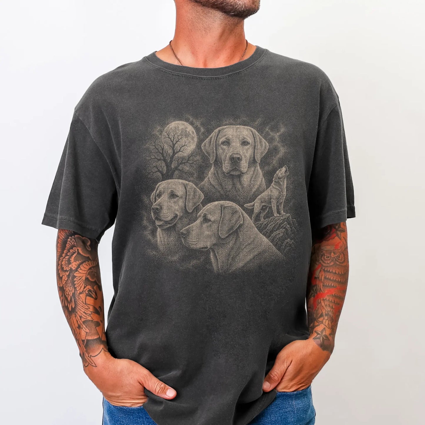 Model wearing a Pepper Comfort Colors® T-shirt with a vintage moon montage featuring Labrador Retriever