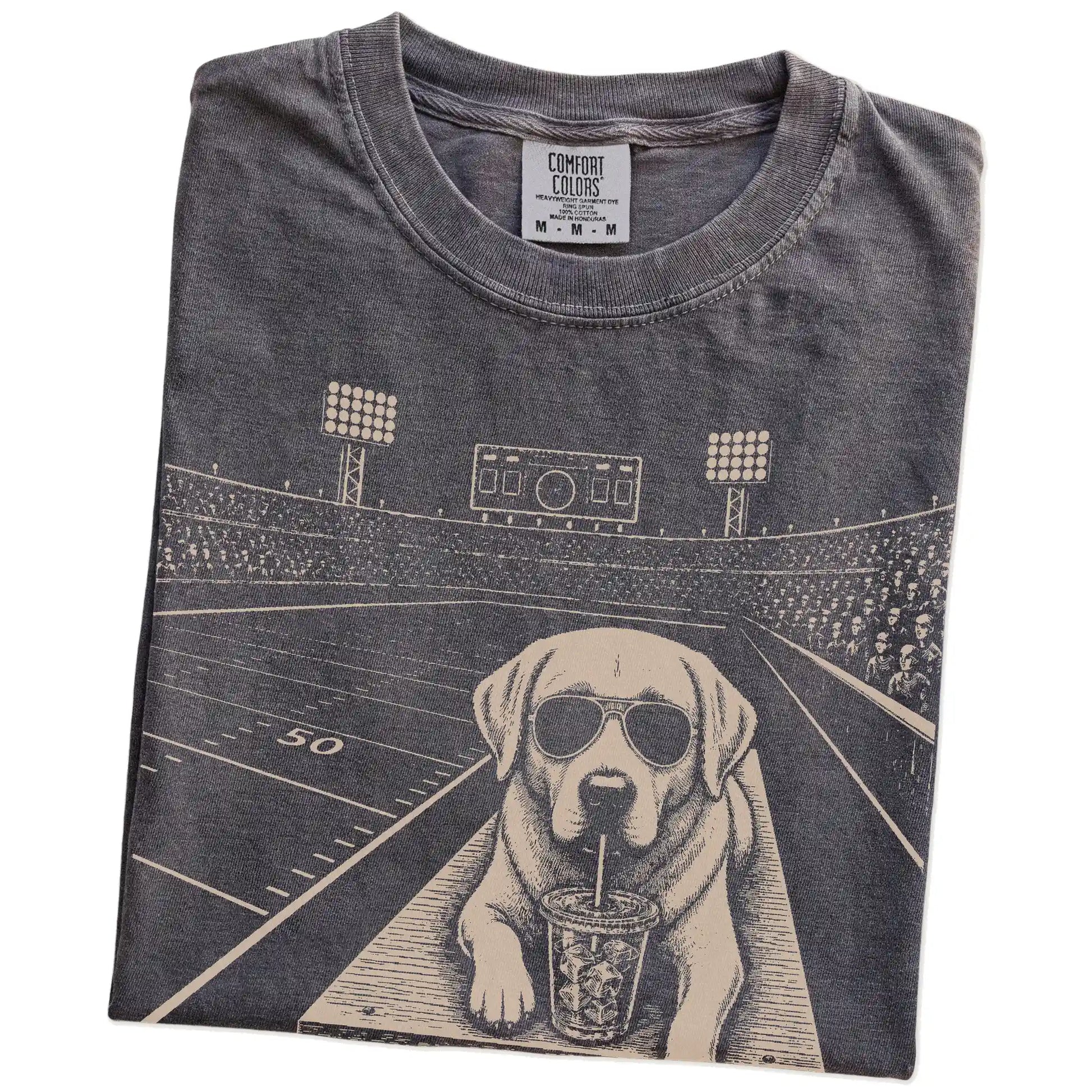 Folded Pepper Comfort Colors® T-shirt showing Labrador Retriever ready for football and tailgate season
