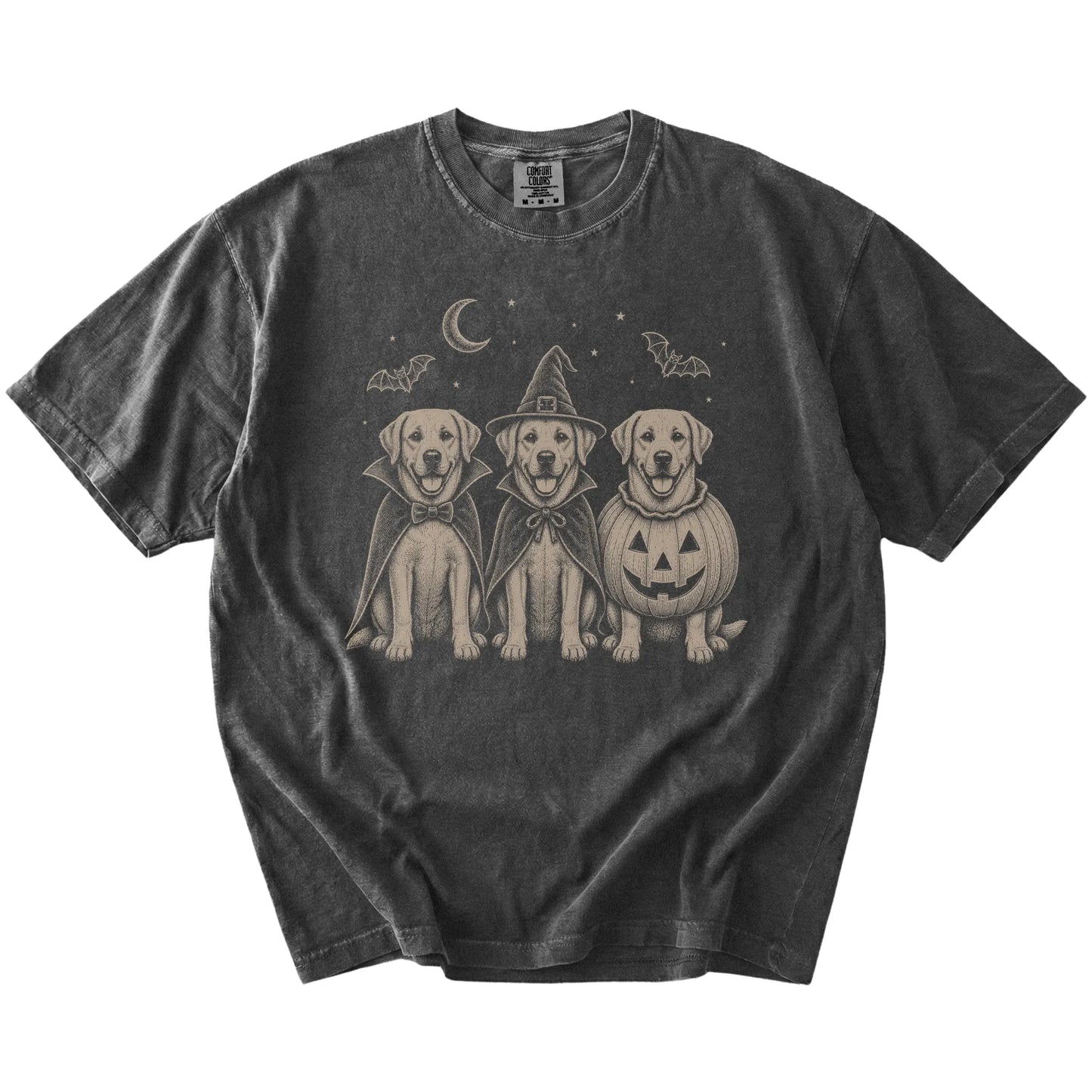 Three Labrador Retriever dogs dressed for Halloween beneath bats and a crescent moon on a Pepper Comfort Colors® T-shirt