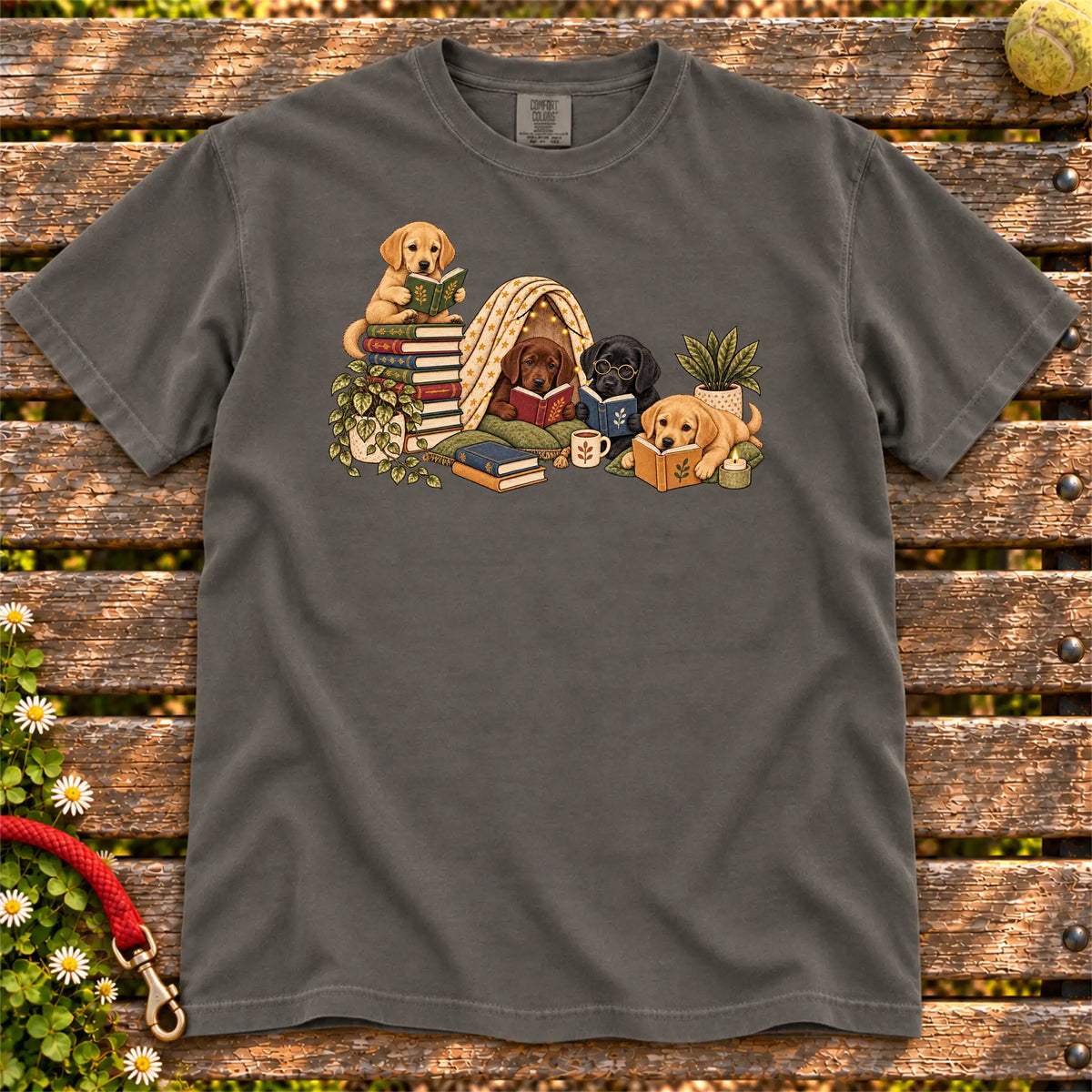 Labrador Retriever puppies reading books in a cozy blanket fort on a Pepper T-shirt