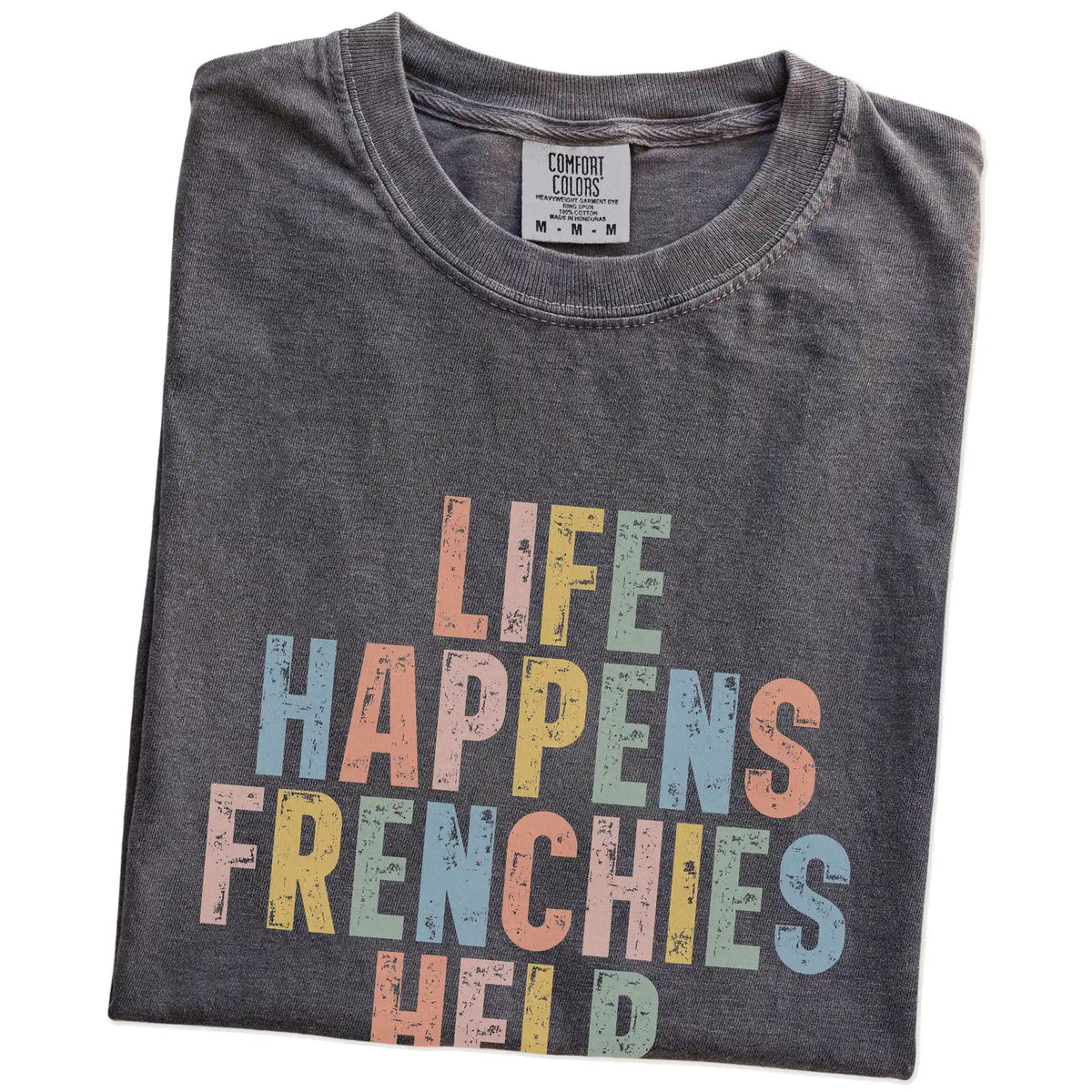 Folded Pepper Comfort Colors® T-shirt showing French Bulldog making hard days better with “Life Happens, Dogs Help” lettering