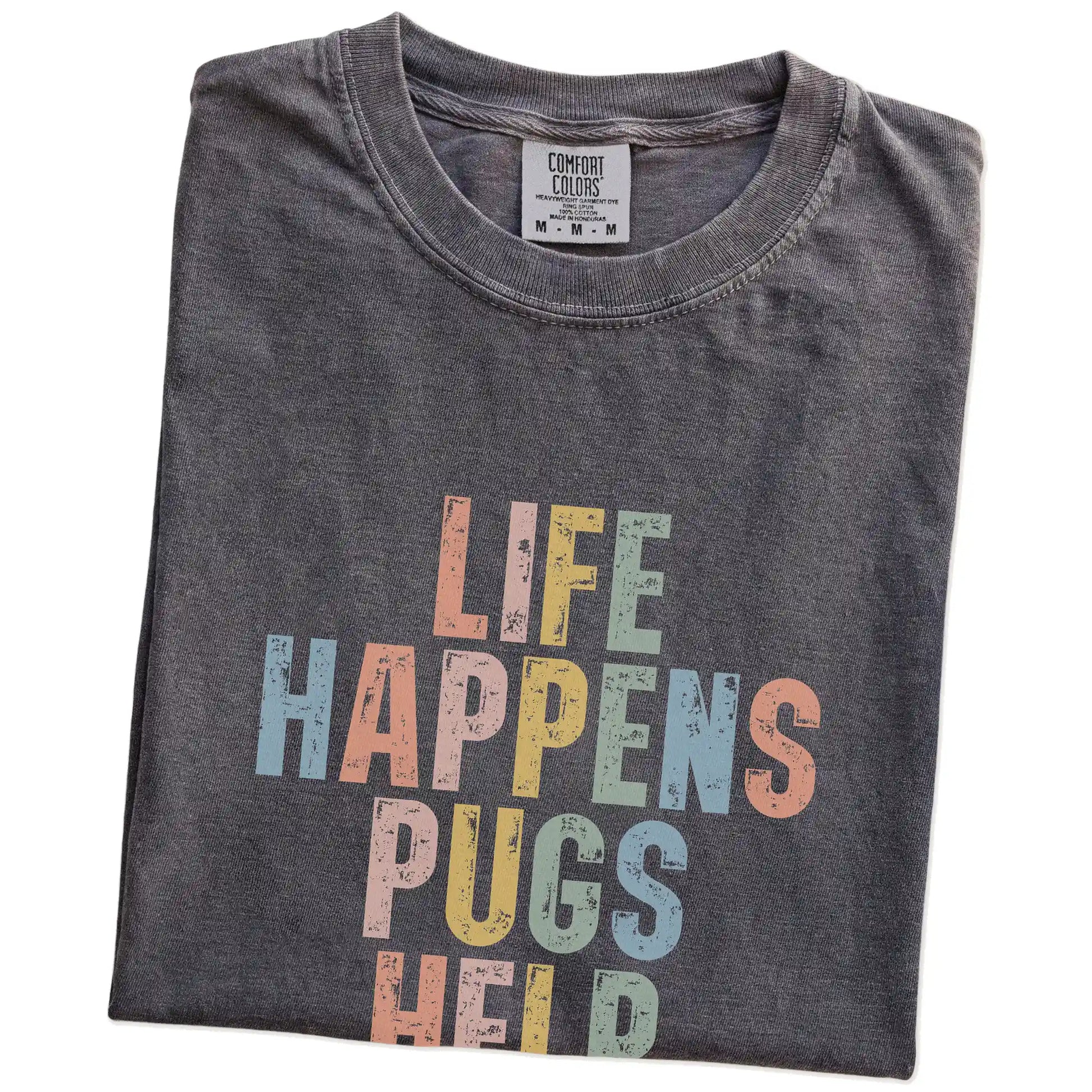 Folded Pepper Comfort Colors® T-shirt showing Pug making hard days better with “Life Happens, Dogs Help” lettering