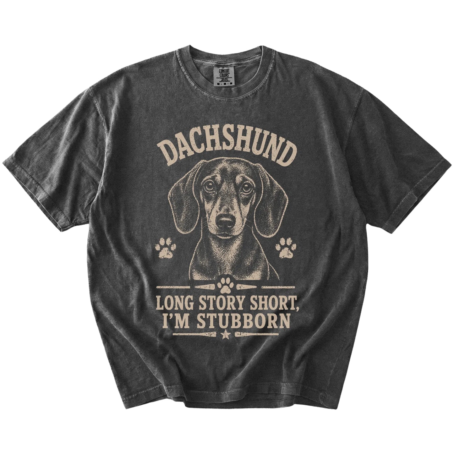 Dachshund design with “Long Story Short, I'm Stubborn” lettering on a Pepper Comfort Colors® T-shirt