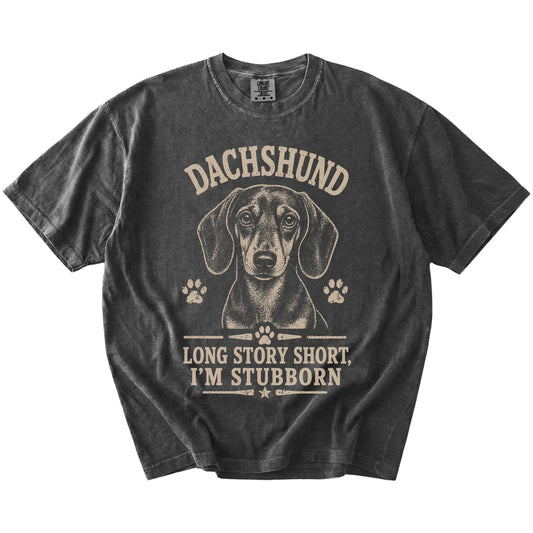 Dachshund design with “Long Story Short, I'm Stubborn” lettering on a Pepper Comfort Colors® T-shirt
