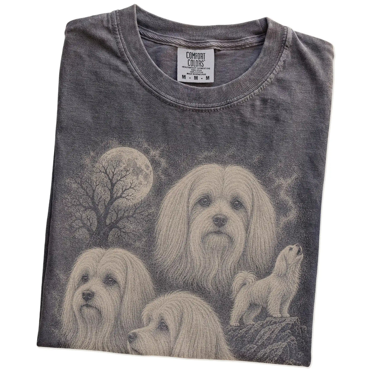 Folded Pepper Comfort Colors® T-shirt showing a vintage moon montage featuring Maltese