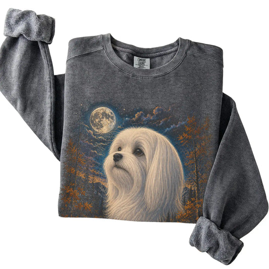 Folded pepper sweatshirt with Maltese Autumn Moon artwork.