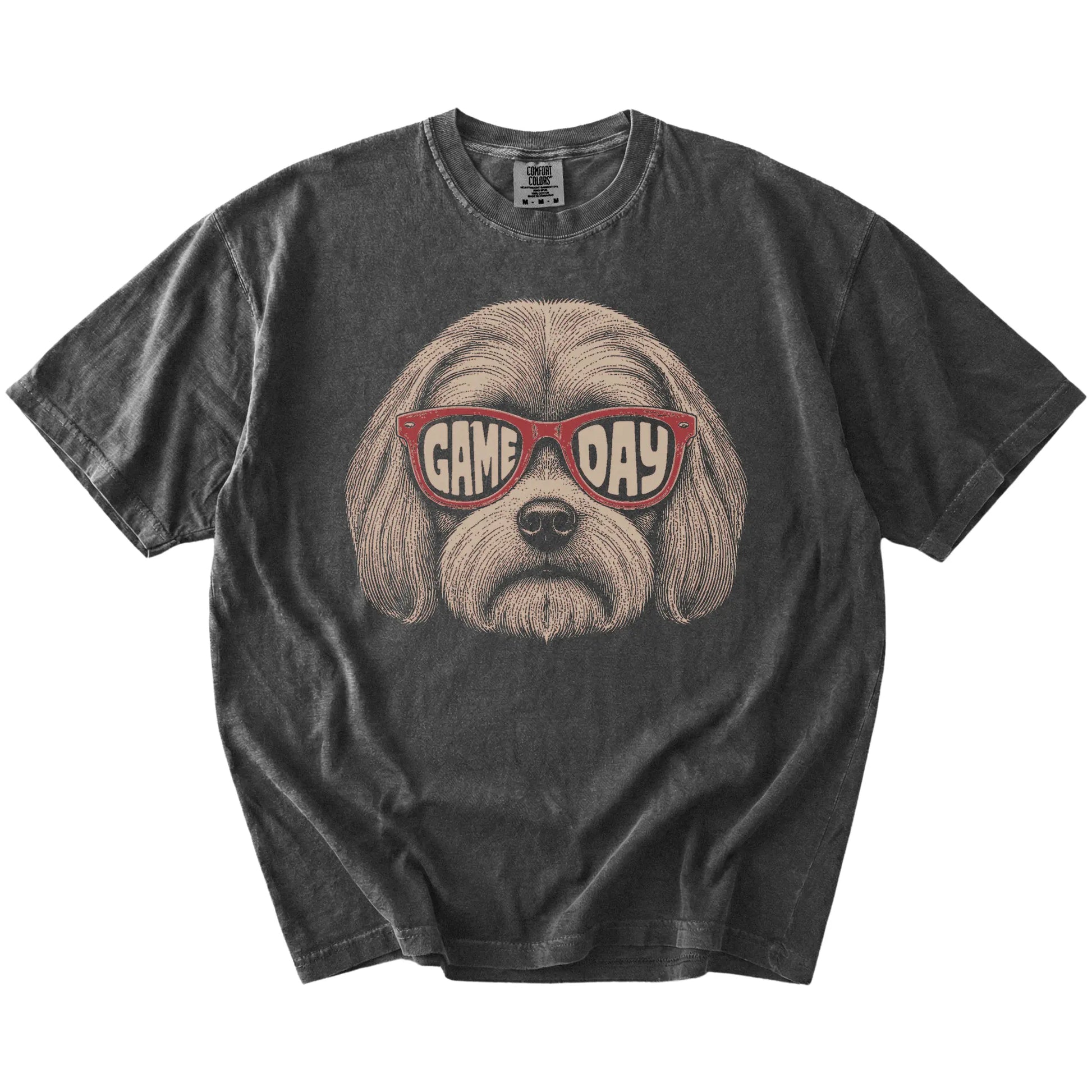 Maltese wearing red Game Day sunglasses on a Pepper Comfort Colors® T-shirt