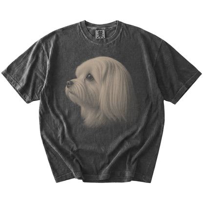 A detailed photographic portrait of a Maltese on a Pepper Comfort Colors® T-shirt