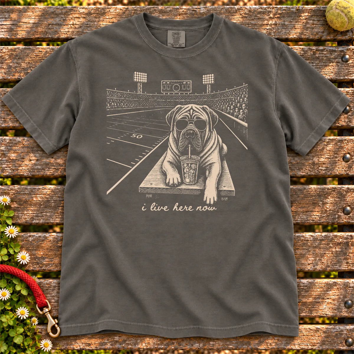 Mastiff Iced Coffee Football design on a Pepper Comfort Colors T-shirt, shown flat