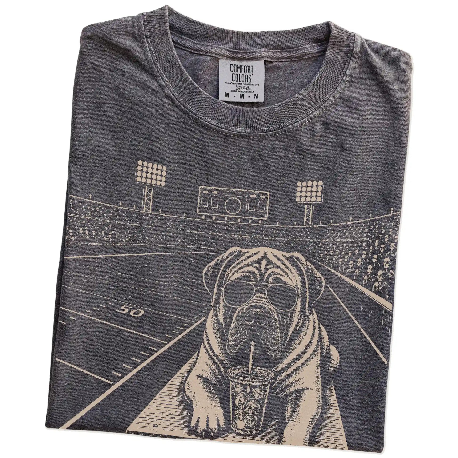 Folded Pepper Comfort Colors® T-shirt showing Mastiff ready for football and tailgate season