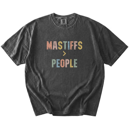 “Mastiffs > People” text on a Pepper Comfort Colors® T-shirt