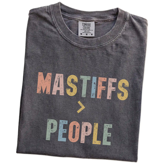 Folded Pepper Comfort Colors® T-shirt showing “Mastiffs > People” text