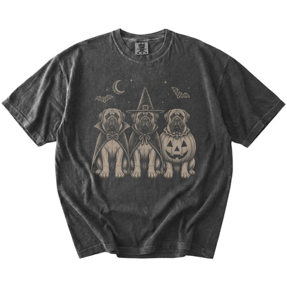 Three Mastiff dogs dressed for Halloween beneath bats and a crescent moon on a Pepper Comfort Colors® T-shirt