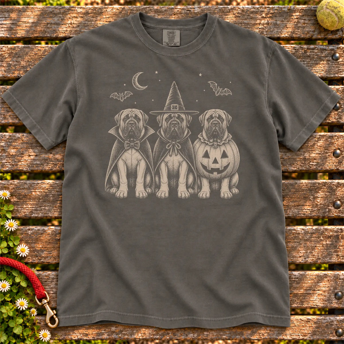 Three Mastiff dogs dressed for Halloween beneath bats and a crescent moon on a Pepper Comfort Colors® T-shirt