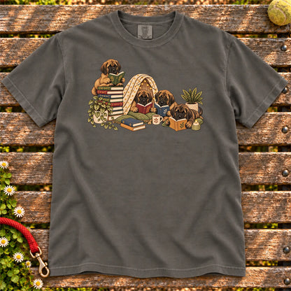 Mastiff puppies reading books in a cozy blanket fort on a Pepper T-shirt