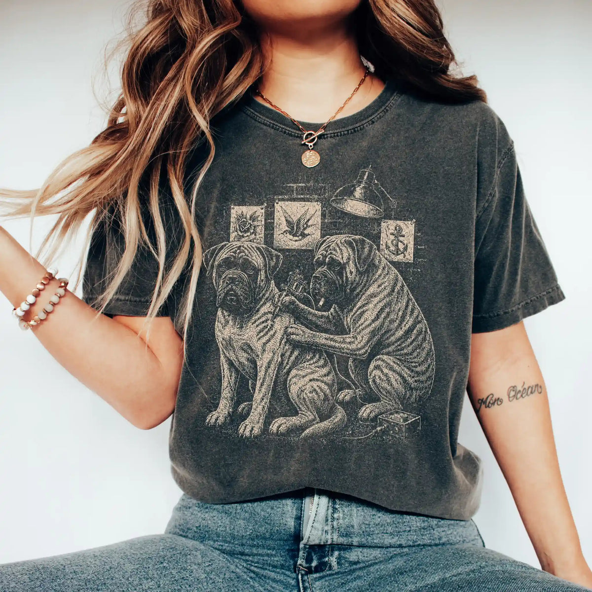 Person wearing a Pepper Mastiff Tattoo t-shirt