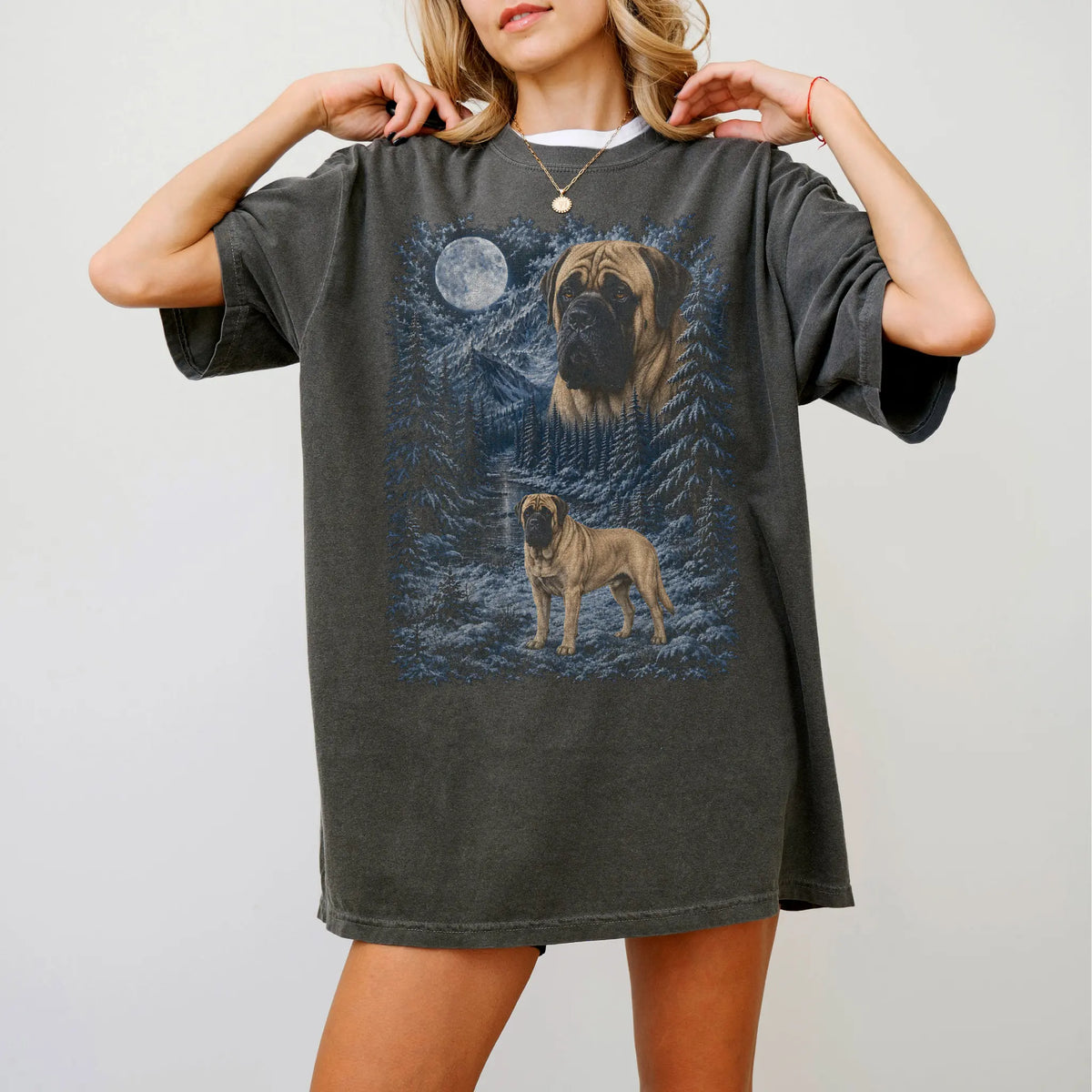 Model wearing a pepper T-shirt with Mastiff Winter Moon artwork.
