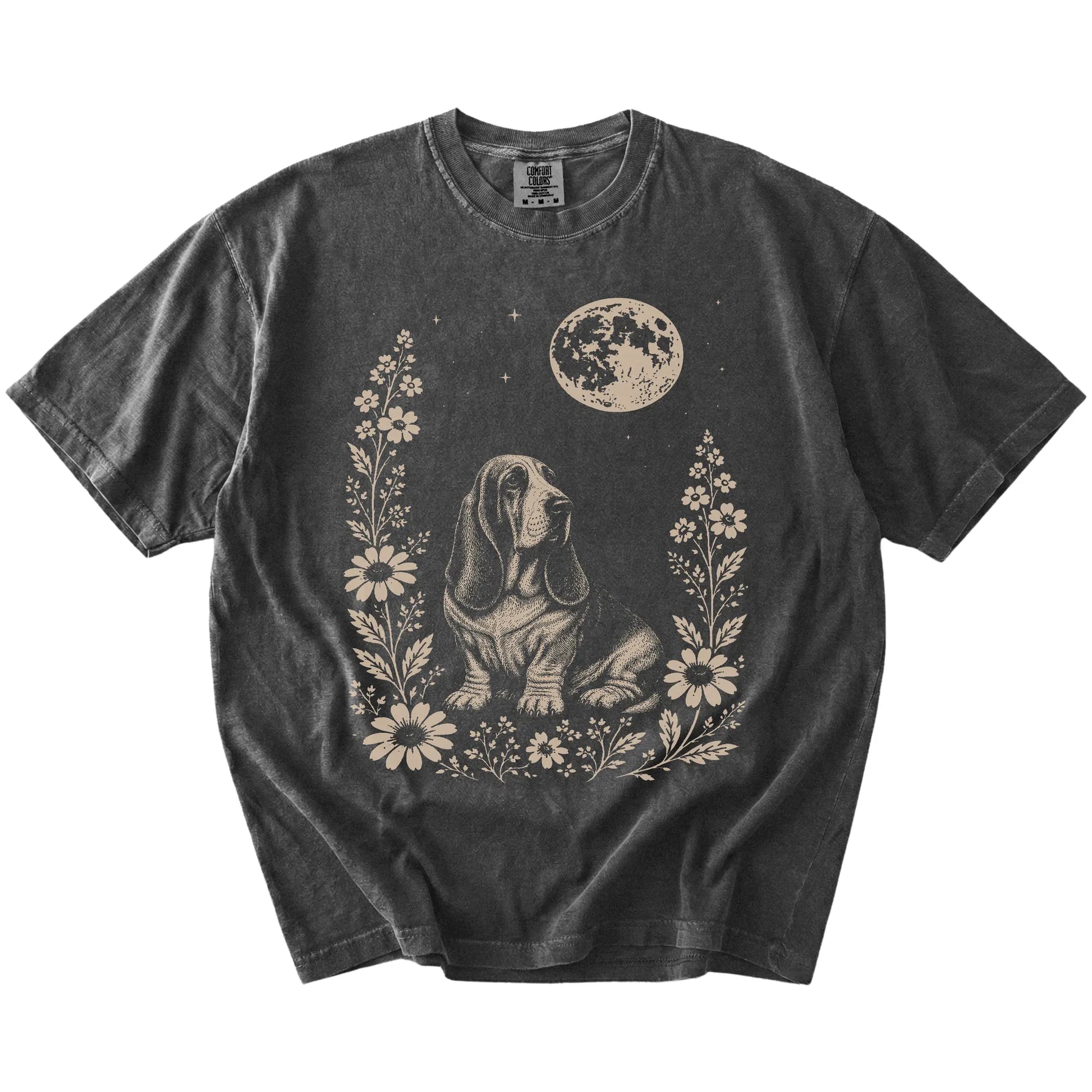 Basset Hound framed by flowers beneath the moon on a Pepper Comfort Colors® T-shirt