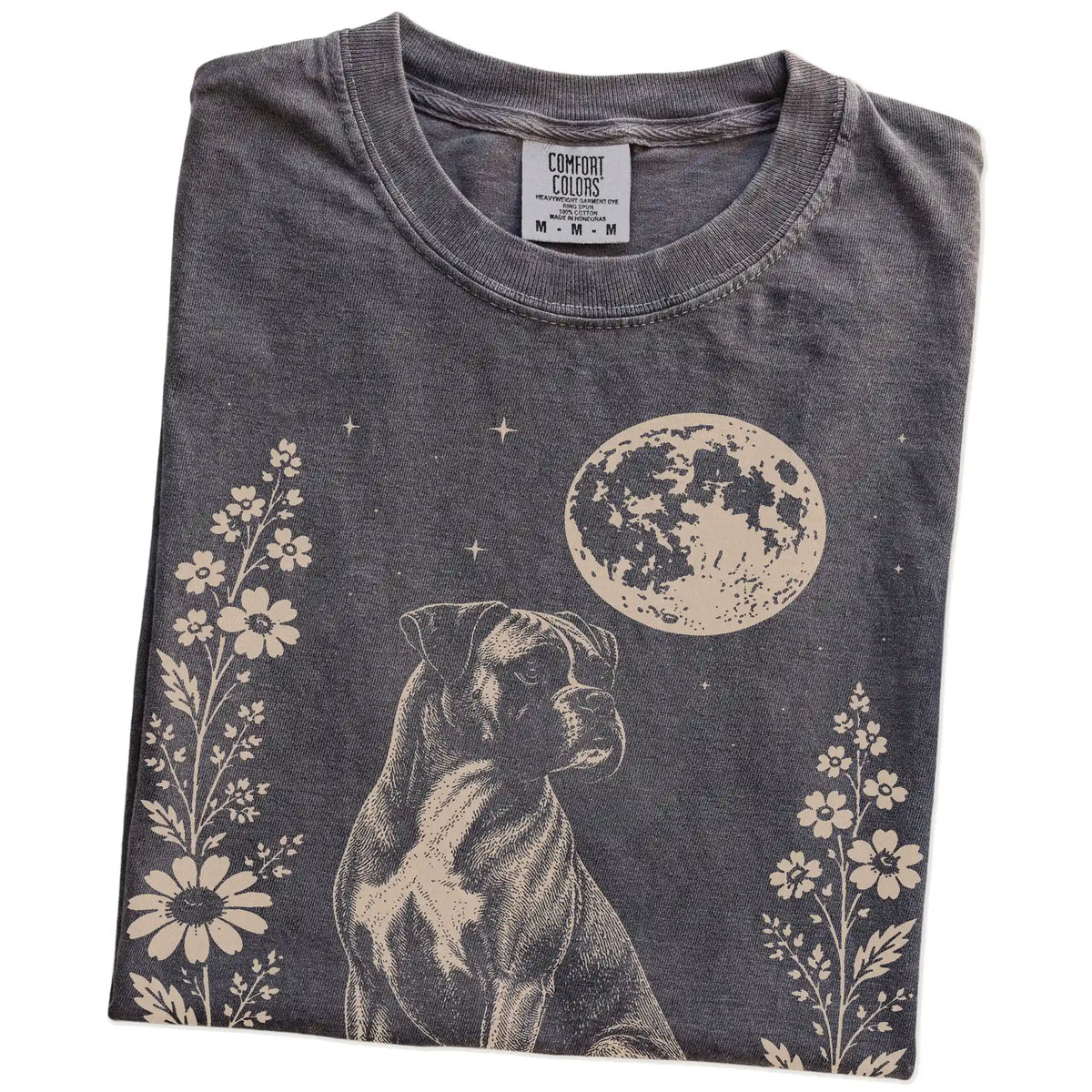 Folded Pepper Comfort Colors® T-shirt showing Boxer framed by flowers beneath the moon