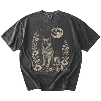German Shepherd framed by flowers beneath the moon on a Pepper Comfort Colors® T-shirt