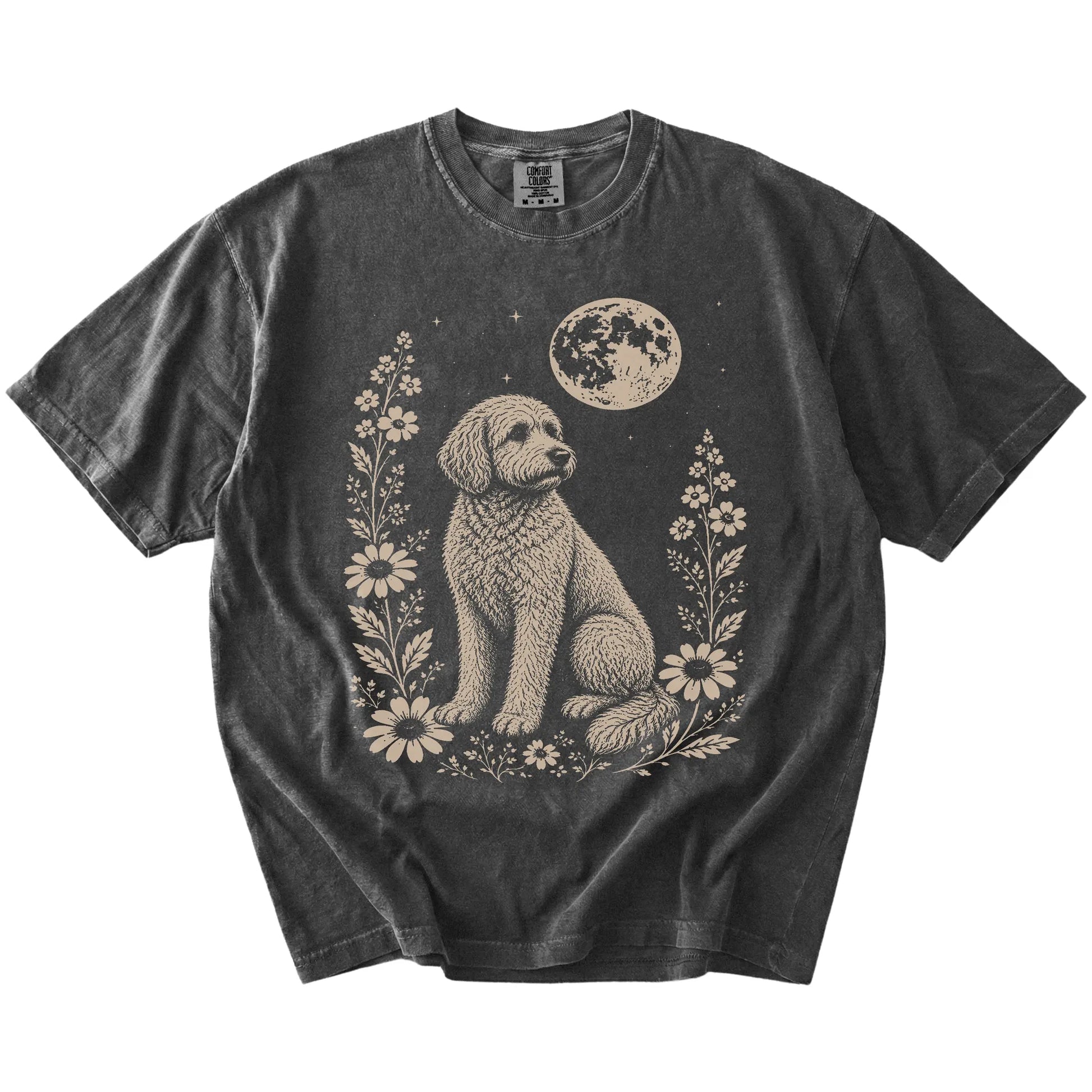 Goldendoodle framed by flowers beneath the moon on a Pepper Comfort Colors® T-shirt