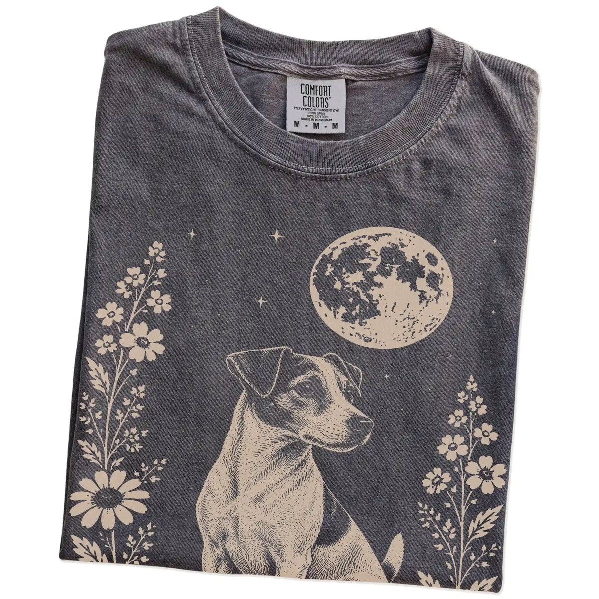 Folded Pepper Comfort Colors® T-shirt showing Jack Russell framed by flowers beneath the moon
