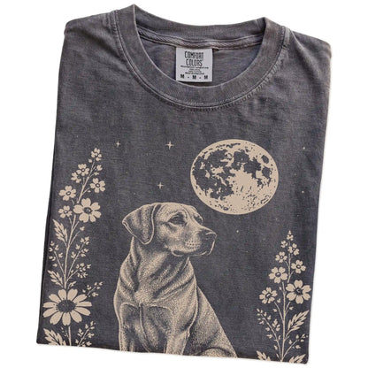 Folded Pepper Comfort Colors® T-shirt showing Labrador Retriever framed by flowers beneath the moon