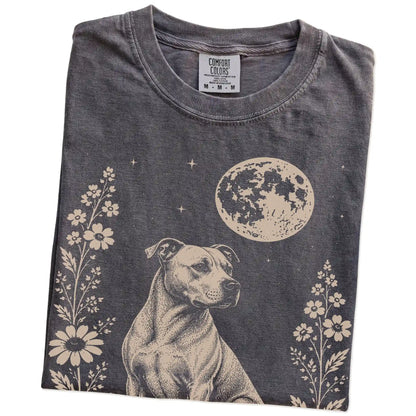 Folded Pepper Comfort Colors® T-shirt showing Pitbull framed by flowers beneath the moon