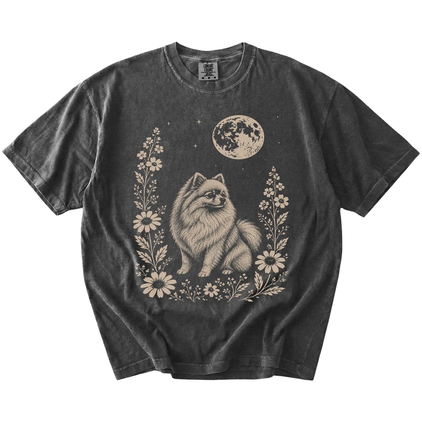 Pomeranian framed by flowers beneath the moon on a Pepper Comfort Colors® T-shirt