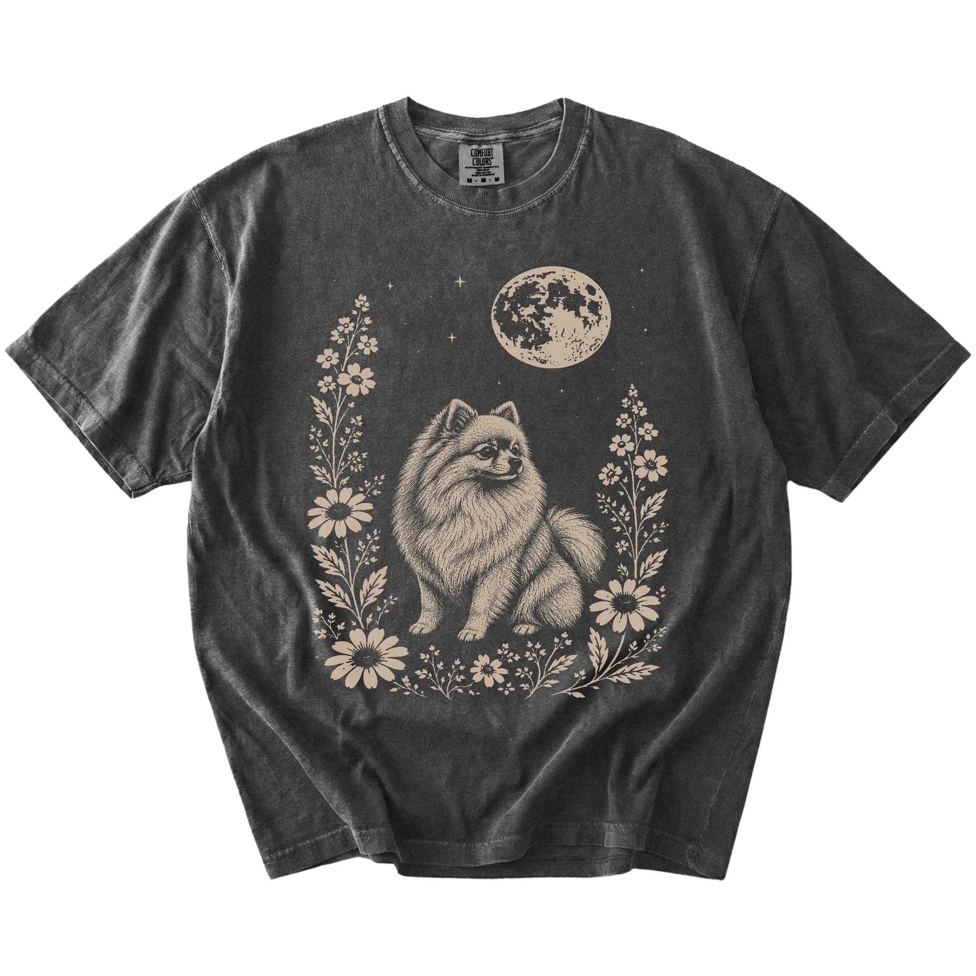 Pomeranian framed by flowers beneath the moon on a Pepper Comfort Colors® T-shirt